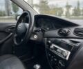 Синий Форд Фокус, объемом двигателя 1.4 л и пробегом 300 тыс. км за 3400 $, фото 5 на Automoto.ua