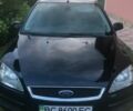Синий Форд Фокус, объемом двигателя 1.8 л и пробегом 310 тыс. км за 3550 $, фото 1 на Automoto.ua