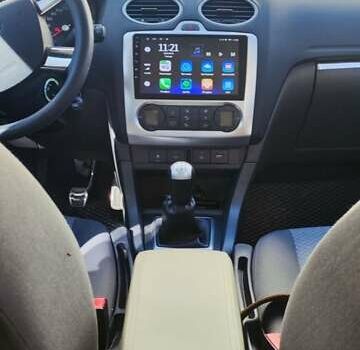 Синий Форд Фокус, объемом двигателя 1.6 л и пробегом 198 тыс. км за 6200 $, фото 2 на Automoto.ua