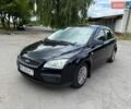 Синій Форд Фокус, об'ємом двигуна 1.39 л та пробігом 195 тис. км за 3650 $, фото 17 на Automoto.ua