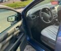 Синий Форд Фокус, объемом двигателя 1.6 л и пробегом 258 тыс. км за 3900 $, фото 2 на Automoto.ua