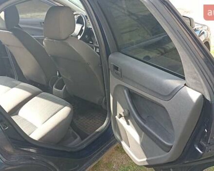 Синий Форд Фокус, объемом двигателя 1.4 л и пробегом 203 тыс. км за 3600 $, фото 6 на Automoto.ua