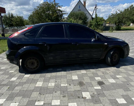 Синий Форд Фокус, объемом двигателя 1.4 л и пробегом 243 тыс. км за 4199 $, фото 6 на Automoto.ua