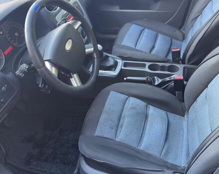 Синий Форд Фокус, объемом двигателя 1.6 л и пробегом 320 тыс. км за 5100 $, фото 4 на Automoto.ua