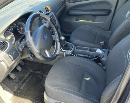 Синий Форд Фокус, объемом двигателя 1.4 л и пробегом 243 тыс. км за 4199 $, фото 11 на Automoto.ua