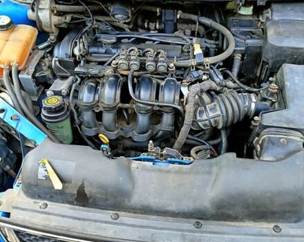 Синий Форд Фокус, объемом двигателя 1.6 л и пробегом 350 тыс. км за 5500 $, фото 11 на Automoto.ua