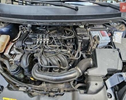 Синий Форд Фокус, объемом двигателя 1.6 л и пробегом 264 тыс. км за 4800 $, фото 14 на Automoto.ua