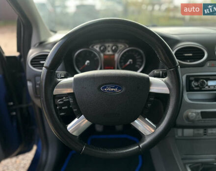 Синий Форд Фокус, объемом двигателя 1.8 л и пробегом 228 тыс. км за 6000 $, фото 29 на Automoto.ua