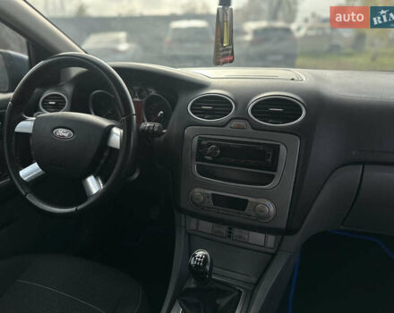 Синий Форд Фокус, объемом двигателя 1.8 л и пробегом 228 тыс. км за 6000 $, фото 49 на Automoto.ua