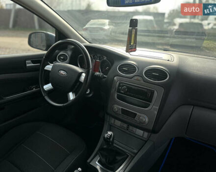 Синий Форд Фокус, объемом двигателя 1.8 л и пробегом 228 тыс. км за 6000 $, фото 50 на Automoto.ua