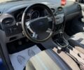 Синий Форд Фокус, объемом двигателя 1.8 л и пробегом 320 тыс. км за 4650 $, фото 8 на Automoto.ua