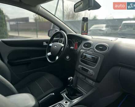 Синий Форд Фокус, объемом двигателя 1.8 л и пробегом 228 тыс. км за 6000 $, фото 48 на Automoto.ua