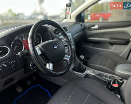 Синий Форд Фокус, объемом двигателя 1.8 л и пробегом 228 тыс. км за 6000 $, фото 25 на Automoto.ua