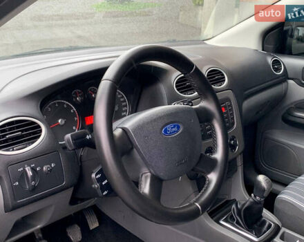 Синий Форд Фокус, объемом двигателя 1.4 л и пробегом 195 тыс. км за 4600 $, фото 26 на Automoto.ua