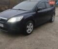 Синий Форд Фокус, объемом двигателя 1.4 л и пробегом 240 тыс. км за 4555 $, фото 1 на Automoto.ua