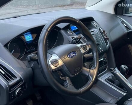 Синій Форд Фокус, об'ємом двигуна 1.6 л та пробігом 258 тис. км за 7990 $, фото 13 на Automoto.ua