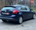 Синій Форд Фокус, об'ємом двигуна 1.6 л та пробігом 258 тис. км за 7990 $, фото 4 на Automoto.ua