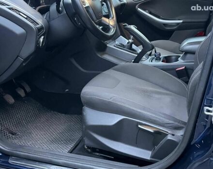 Синій Форд Фокус, об'ємом двигуна 1.6 л та пробігом 258 тис. км за 7990 $, фото 16 на Automoto.ua