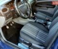 Синий Форд Фокус, объемом двигателя 1.4 л и пробегом 185 тыс. км за 6100 $, фото 1 на Automoto.ua