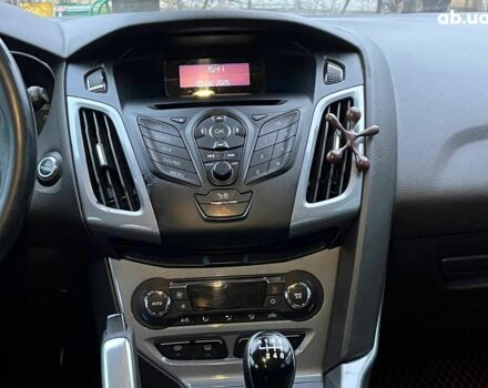 Синій Форд Фокус, об'ємом двигуна 1.6 л та пробігом 258 тис. км за 7990 $, фото 17 на Automoto.ua