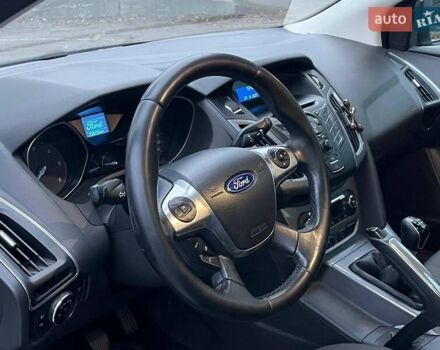 Синій Форд Фокус, об'ємом двигуна 1.6 л та пробігом 258 тис. км за 7990 $, фото 14 на Automoto.ua