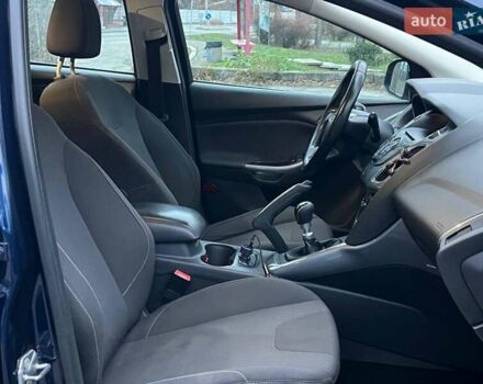 Синій Форд Фокус, об'ємом двигуна 1.6 л та пробігом 258 тис. км за 7990 $, фото 11 на Automoto.ua