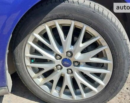 Синій Форд Фокус, об'ємом двигуна 2 л та пробігом 215 тис. км за 7750 $, фото 35 на Automoto.ua