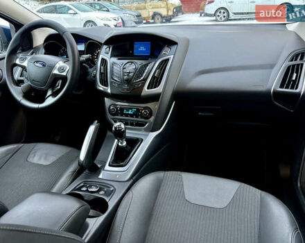 Синій Форд Фокус, об'ємом двигуна 1.6 л та пробігом 221 тис. км за 6999 $, фото 20 на Automoto.ua