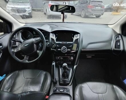 Синій Форд Фокус, об'ємом двигуна 2 л та пробігом 303 тис. км за 6940 $, фото 13 на Automoto.ua