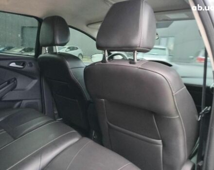 Синій Форд Фокус, об'ємом двигуна 2 л та пробігом 303 тис. км за 6940 $, фото 15 на Automoto.ua