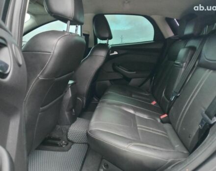 Синій Форд Фокус, об'ємом двигуна 2 л та пробігом 303 тис. км за 6940 $, фото 17 на Automoto.ua