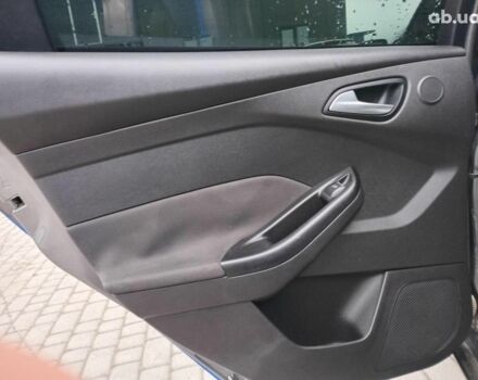 Синій Форд Фокус, об'ємом двигуна 2 л та пробігом 303 тис. км за 6940 $, фото 18 на Automoto.ua