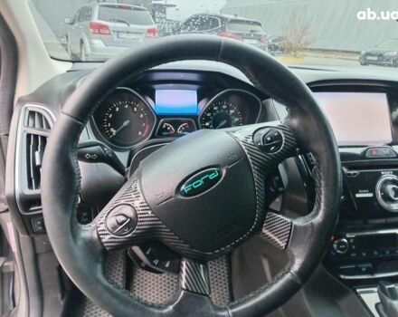 Синій Форд Фокус, об'ємом двигуна 2 л та пробігом 303 тис. км за 6940 $, фото 21 на Automoto.ua