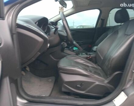 Синій Форд Фокус, об'ємом двигуна 2 л та пробігом 303 тис. км за 6940 $, фото 20 на Automoto.ua