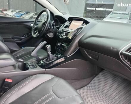 Синій Форд Фокус, об'ємом двигуна 2 л та пробігом 303 тис. км за 6940 $, фото 11 на Automoto.ua