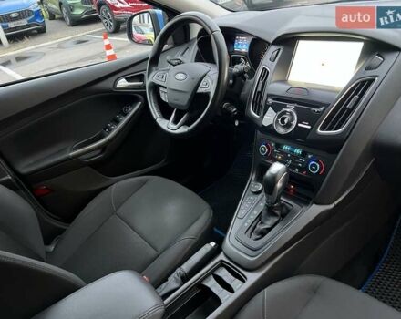 Синий Форд Фокус, объемом двигателя 1 л и пробегом 66 тыс. км за 11773 $, фото 22 на Automoto.ua