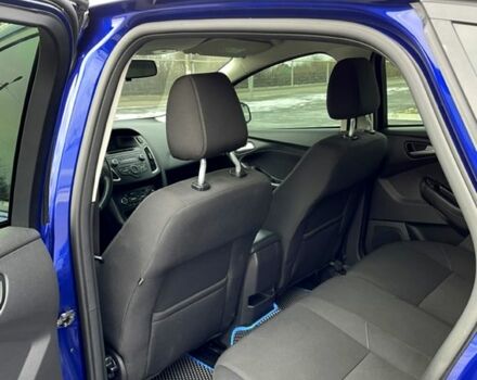 Синій Форд Фокус, об'ємом двигуна 1 л та пробігом 105 тис. км за 9000 $, фото 4 на Automoto.ua