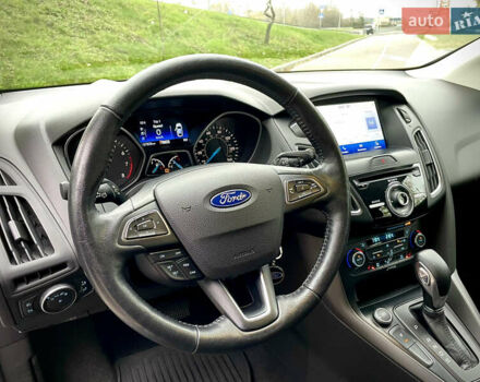 Синий Форд Фокус, объемом двигателя 2 л и пробегом 57 тыс. км за 11200 $, фото 49 на Automoto.ua