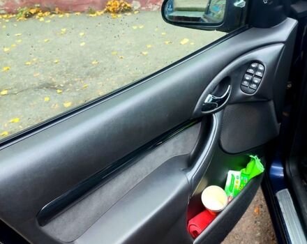 Синий Форд Фокус, объемом двигателя 1.8 л и пробегом 220 тыс. км за 3600 $, фото 2 на Automoto.ua