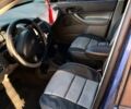 Синій Форд Фокус, об'ємом двигуна 2 л та пробігом 200 тис. км за 2000 $, фото 1 на Automoto.ua