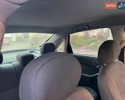 Синий Форд Фокус, объемом двигателя 1.6 л и пробегом 300 тыс. км за 3300 $, фото 2 на Automoto.ua