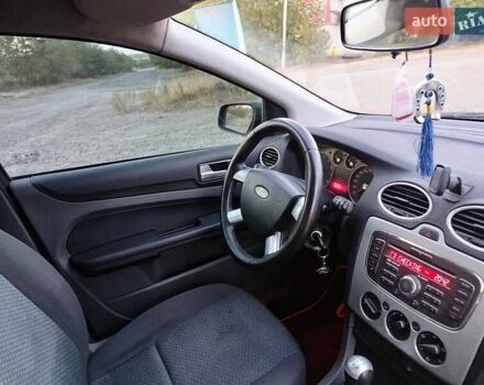 Синий Форд Фокус, объемом двигателя 1.6 л и пробегом 259 тыс. км за 4000 $, фото 47 на Automoto.ua