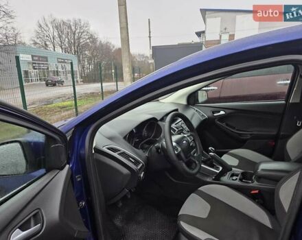 Синій Форд Фокус, об'ємом двигуна 1 л та пробігом 176 тис. км за 7300 $, фото 15 на Automoto.ua