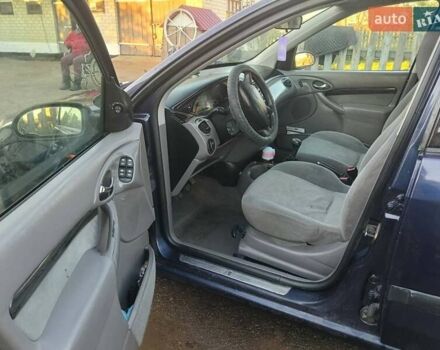 Синий Форд Фокус, объемом двигателя 1.8 л и пробегом 300 тыс. км за 2650 $, фото 4 на Automoto.ua