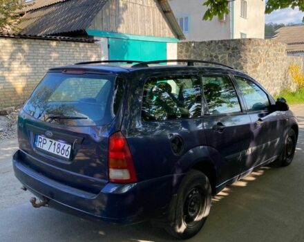 Синій Форд Фокус, об'ємом двигуна 1.8 л та пробігом 317 тис. км за 1100 $, фото 3 на Automoto.ua