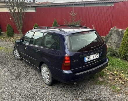 Синий Форд Фокус, объемом двигателя 1.8 л и пробегом 300 тыс. км за 1300 $, фото 2 на Automoto.ua