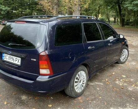 Синий Форд Фокус, объемом двигателя 1.8 л и пробегом 325 тыс. км за 2599 $, фото 4 на Automoto.ua