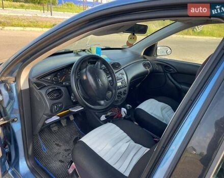 Синий Форд Фокус, объемом двигателя 1.6 л и пробегом 218 тыс. км за 1800 $, фото 16 на Automoto.ua