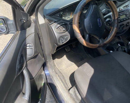 Синий Форд Фокус, объемом двигателя 1.8 л и пробегом 365 тыс. км за 3250 $, фото 7 на Automoto.ua