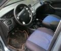 Синий Форд Фокус, объемом двигателя 1.8 л и пробегом 200 тыс. км за 3200 $, фото 3 на Automoto.ua